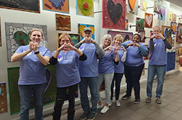 HeartHands_265x175 Group of Catalent Cares volunteers making heart hands