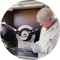 Scientist working with Solid-State Characterization Services